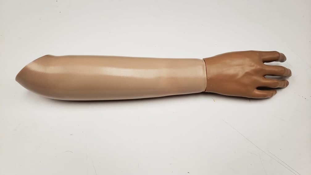 Prosthetic arm with hand